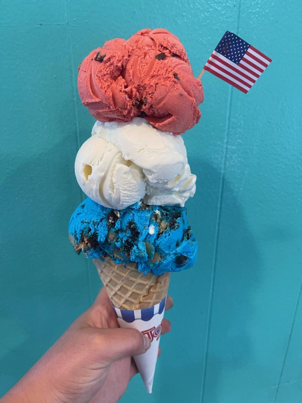 A triple-scoop ice cream cone from Lickity Splitz